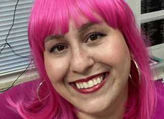 Image: A woman wearing a pink wig