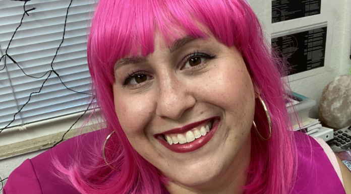 Image: A woman wearing a pink wig