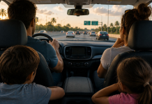 Family Vacations: Are We There Yet? Man, woman, boy and girl in a car on the highway
