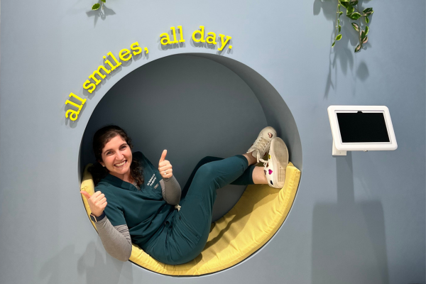Image: Dr. Rebecca Lenard of All Smiles Pediatric Dentistry smiles and gives two thumbs up