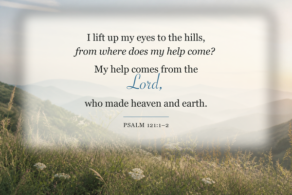 Scenic mountain landscape at sunset featuring Psalm 121:1–2: “I lift up my eyes to the hills… My help comes from the Lord, who made heaven and earth.”