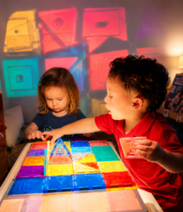 Image: Children participating in light play at Sol Academy